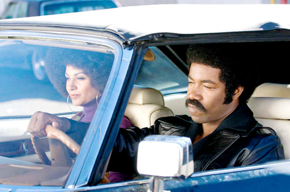 ©2009, Apparition (L-R) Salli Richardson as Gloria and Michael Jai White as Black Dynamite in BLACK DYNAMITE, an Apparition release.