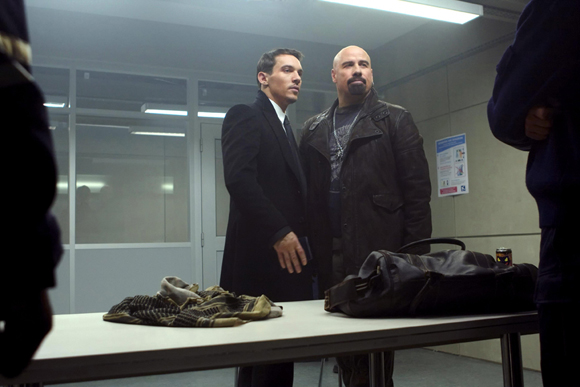 ©2010, Lionsgate Jonathan Rhys Meyers (as James Reese, left) and John Travolta (as Charlie Wax, right) star in FROM PARIS WITH LOVE. Photo credit: Rico Torres